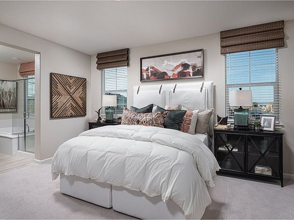 The large owner s suite offers plenty of wardrobe storage in the walk-in closet, while the en-suite