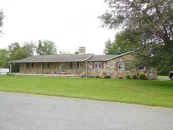 Shows huge front porch.