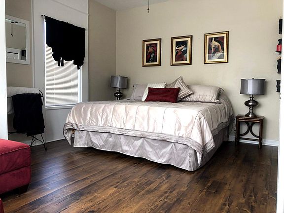 Master bedroom with king size bed, ensuite bathroom, private yard and private entrance