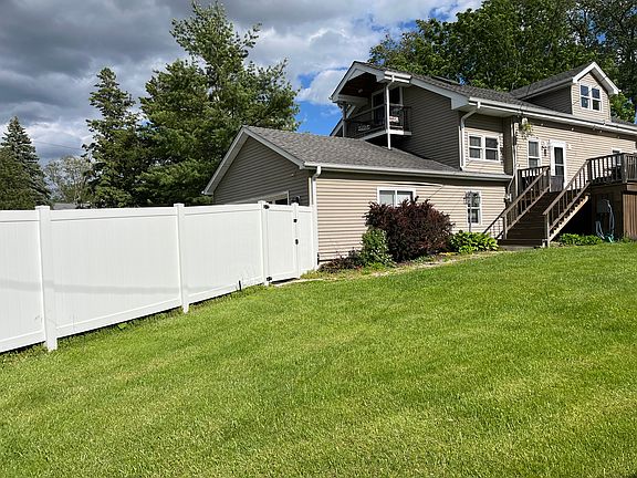 The main entrance to the home is off of the main floor deck. Access is also available through the garage.