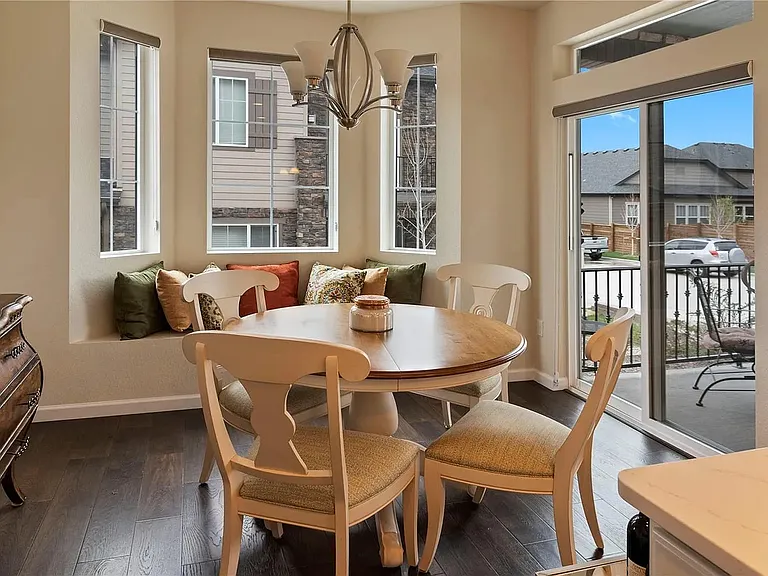 Dining area with patio access and abundant natural light