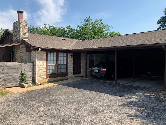 2-car carport (1 per Unit).
