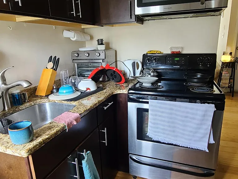 Kitchen with granite counters and stainless steel appliances