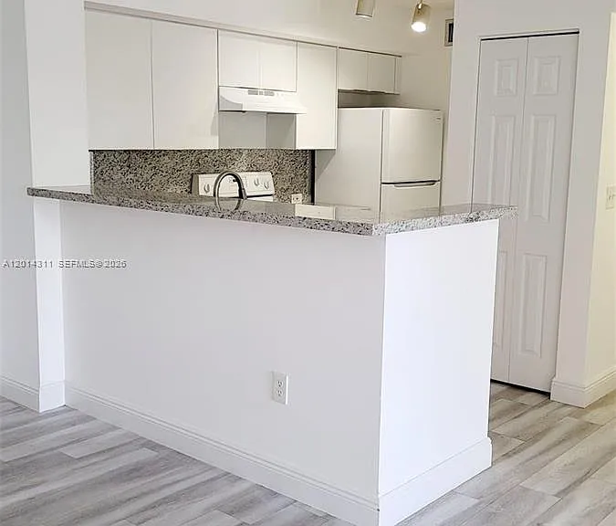 11155 SW 5th Pl #203 — Photo 4