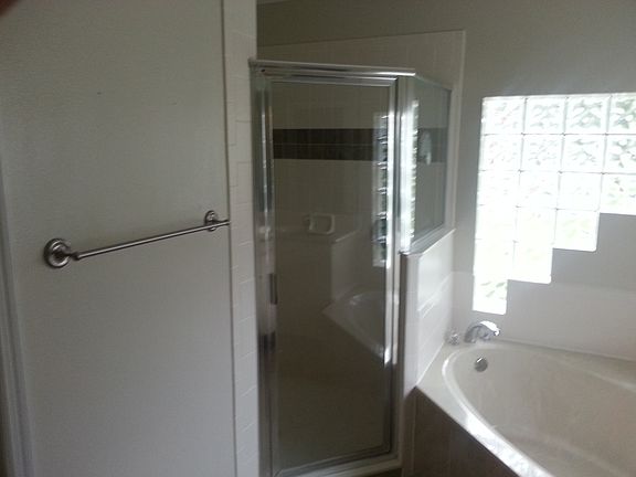 master bath with shower, Jacuzzi and separate toilet