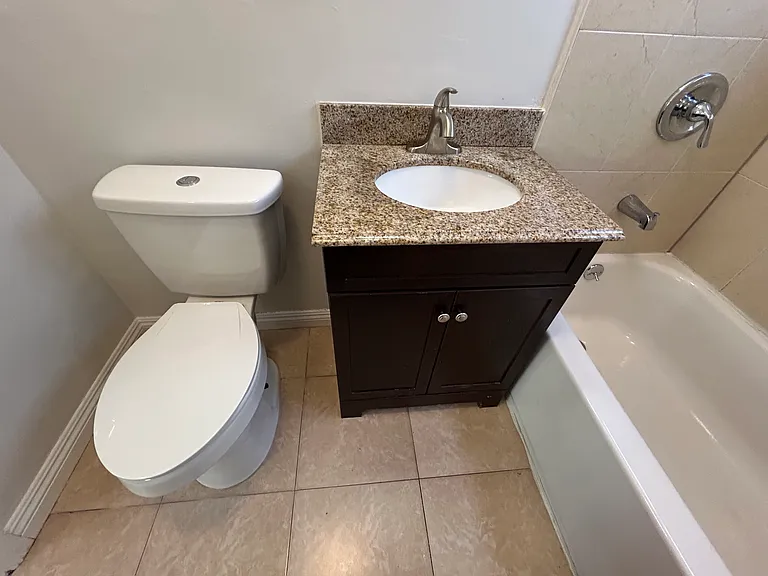 Bathroom wooden and granite vanity, new faucet.