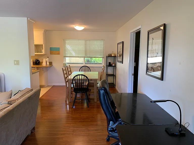 View from sitting to dining and kitchen