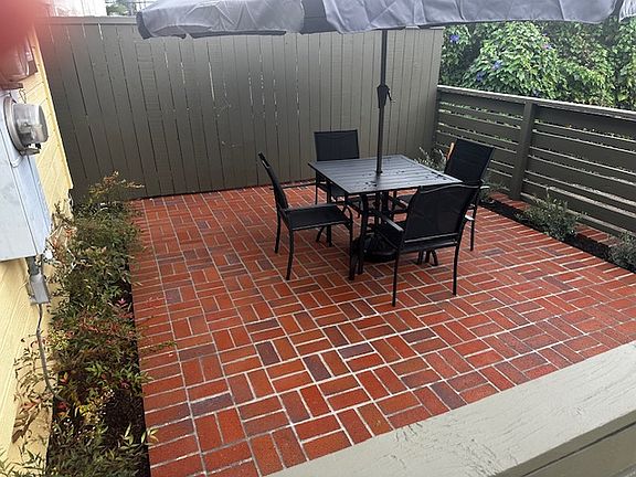 Private front patio. Furniture included