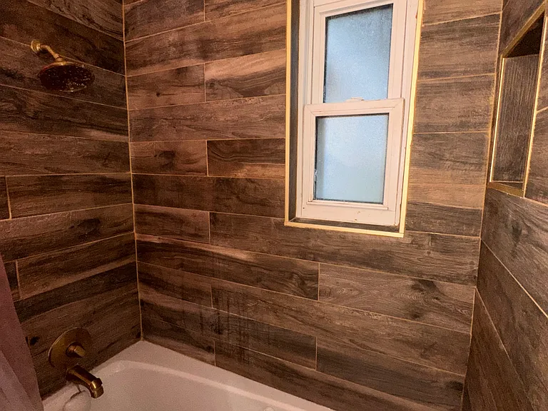Cozy bathroom featuring a relaxing Jacuzzi soaking tub, perfect for unwinding after a long day.