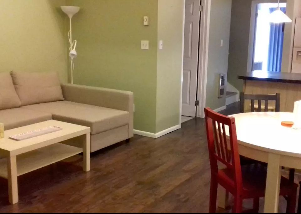 Furnished living room with queen sleeper sofa.