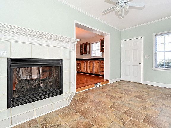 Bonus/sun room: tile floors,gas fireplace,bay window.
