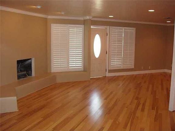 Living Room with Wood Burning Fireplace