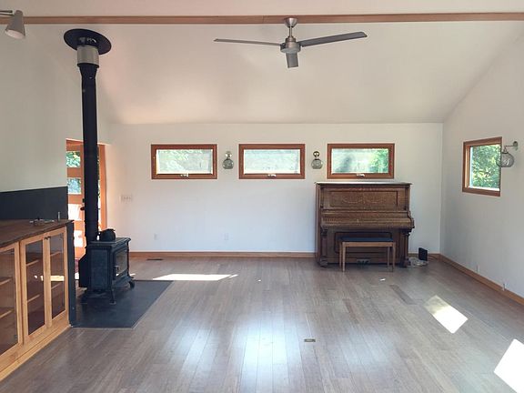 vaulted ceiling and soapstone wood stove