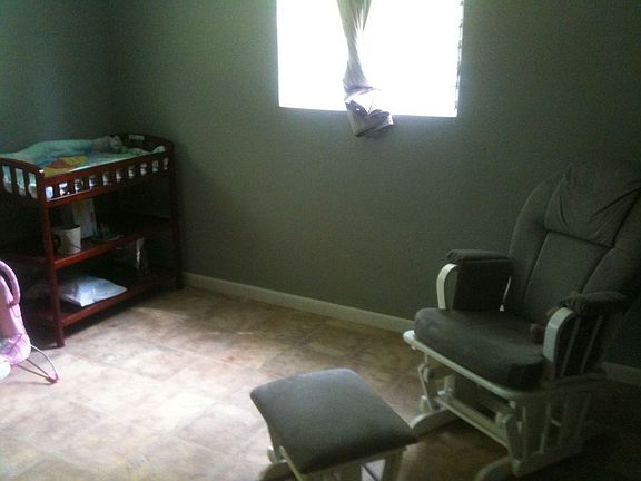Same bedroom; we removed all carpeting, heavy vinyl tile thru house.
