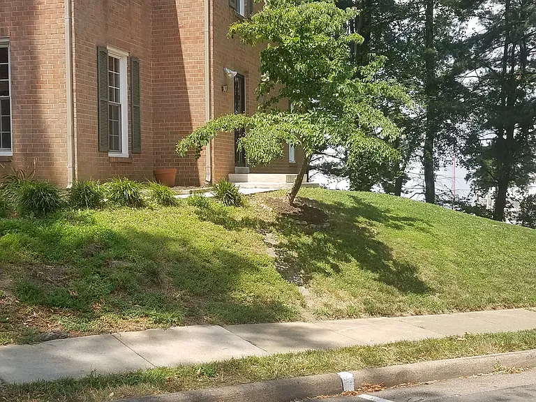 Front of home with added curbside parking