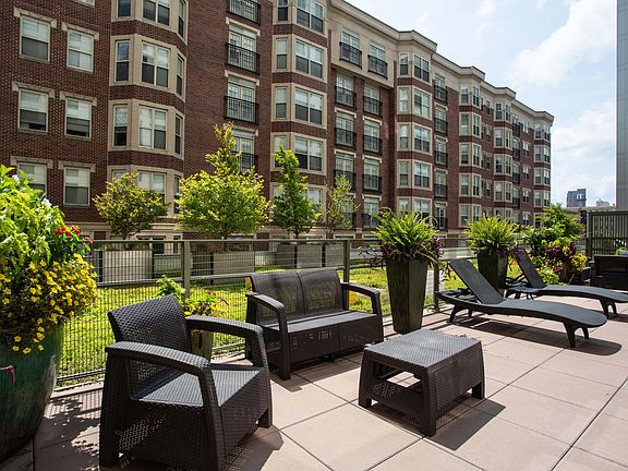 Our club room patio is nestled in the south of the building overlooking our green roof