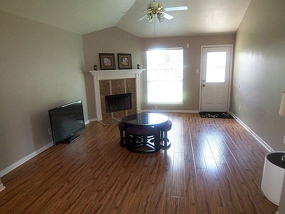 NICE SIZE DEN WITH HIGH CEILINGS