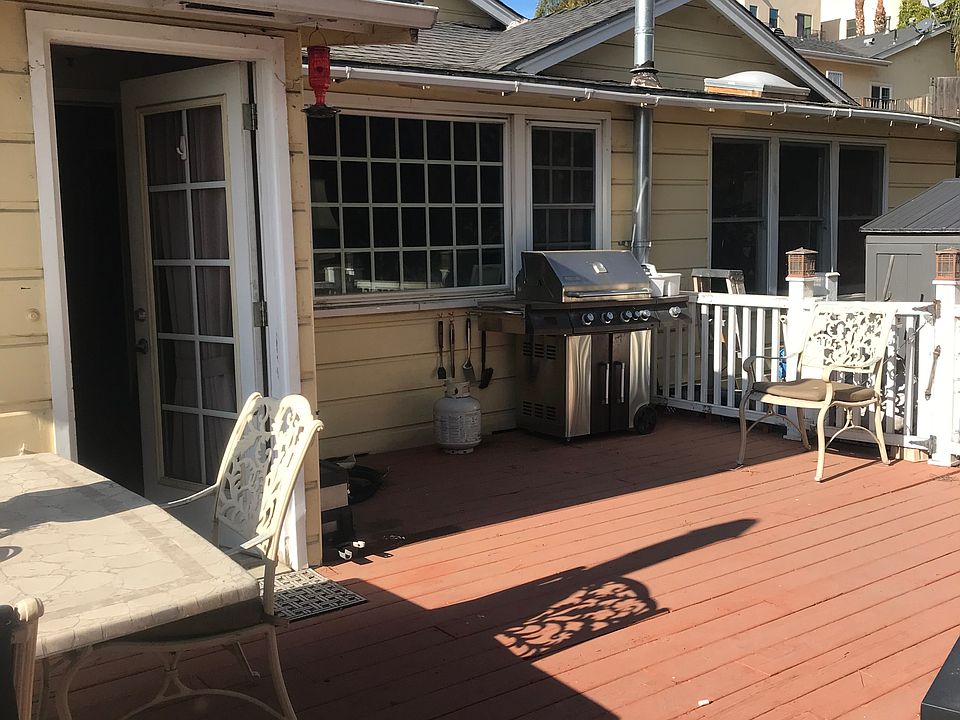 Nice Roomy Deck for extra outdoor living space and entertaining. This is the entrance closest to the private driveway.