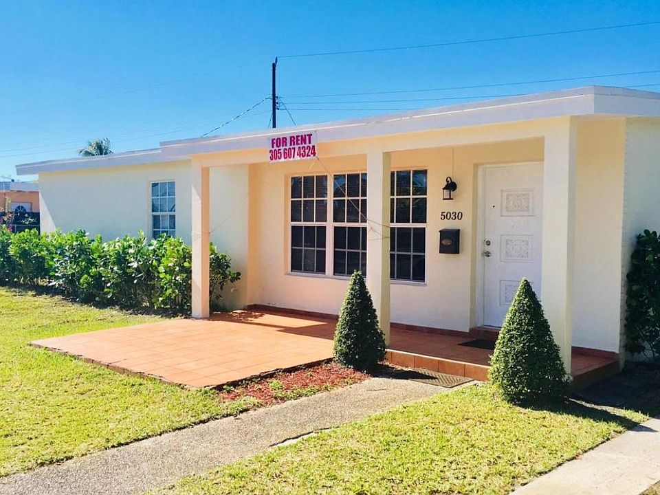 Bright home with Mexican tile front porch and French windows. Ample parking for 4 cars.