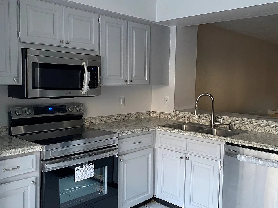 Ample cabinet space and modern appliances.
