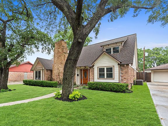 Beautiful view of the lush green lawn and mature trees!