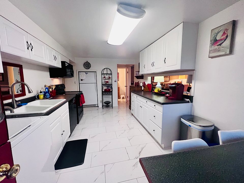 Fully stocked kitchen awaits - Dishwasher, Stove, plus in unit Washer & Dryer add extra convenience