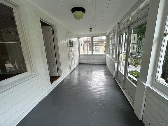 Large Sun Porch! Adjacent to Den and Living Room!