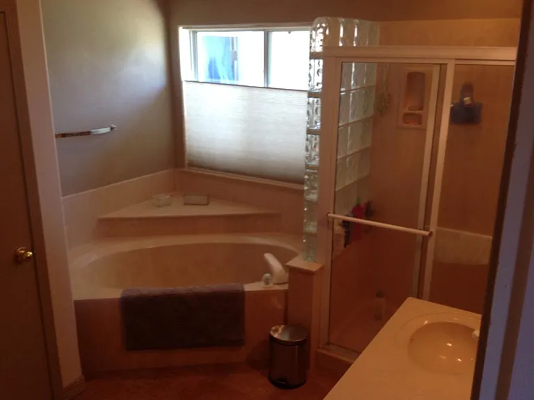 On suite main Bath_. 6ft soaking tub, separate shower, double sinks, private toilet room, linen closet & walk-in closet_
This bathroom has its own 50 gallon hot water heater_