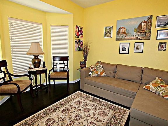 WORKING FROM A HOME IS A DELIGHT IN THE HOME OFFICE WITH A BAY WINDOW.
