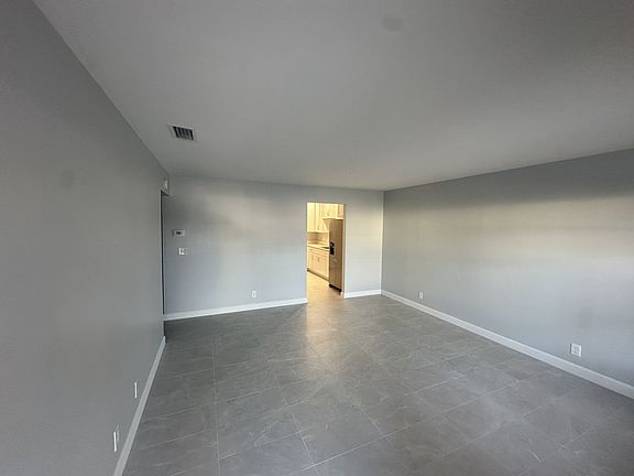 Living room, brand new tile throughout