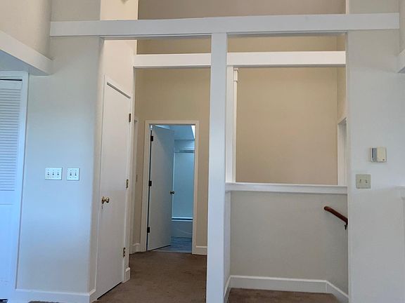 Main hall with cathedral ceilings and skylight.