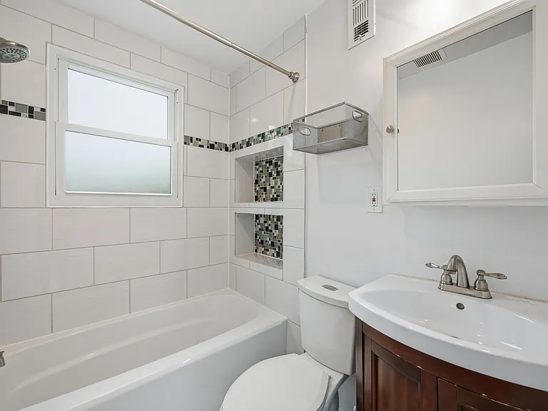 Updated Full Bathroom with Shower and Vanity