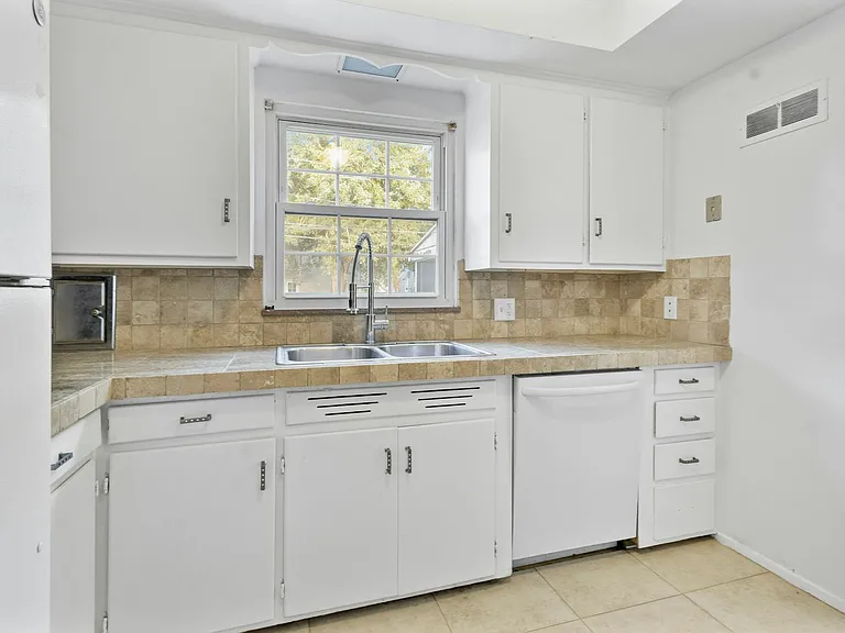 3836 Woodmont Rd — Photo 4