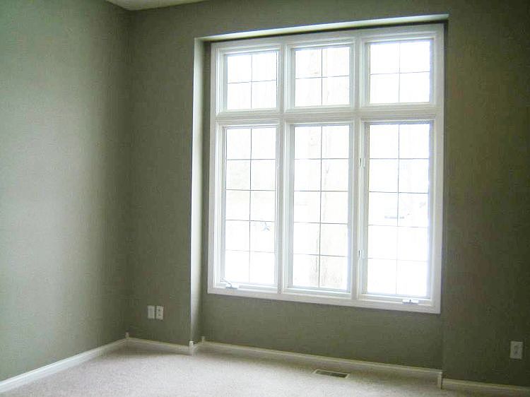 The large front window in the front sitting room lets in the natural light.  This room would be a great reading room, music room, library, or main floor office.  You decide!