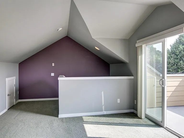 Loft/flex room with vaulted ceiling on the top floor, sliding glass door to the large private balcony with views of Mt. Rainier & Territorial views plus multiple storage spaces
