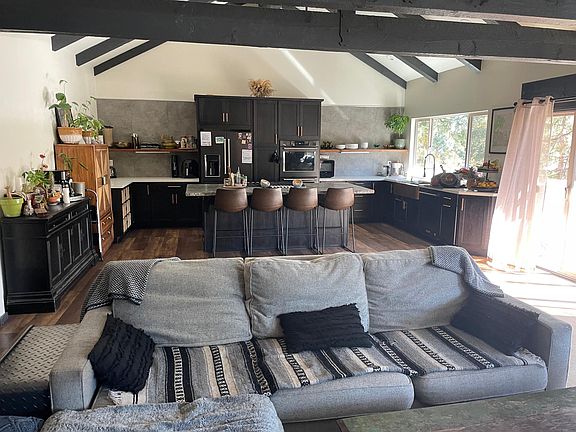Kitchen and upstairs living space 2 of 4