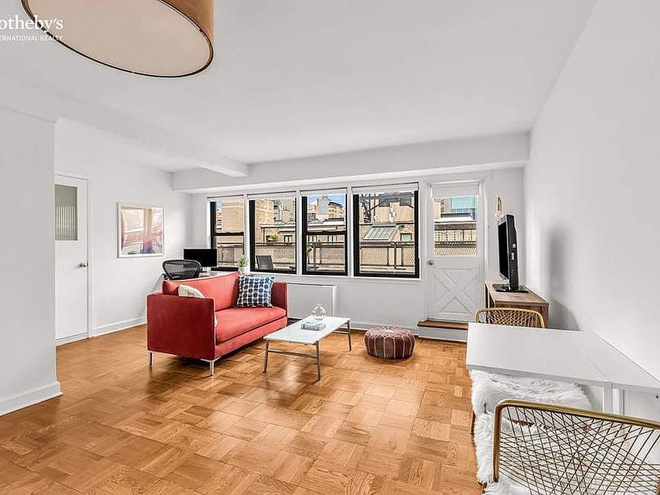 1st image of 55 E 9th St APT 12A