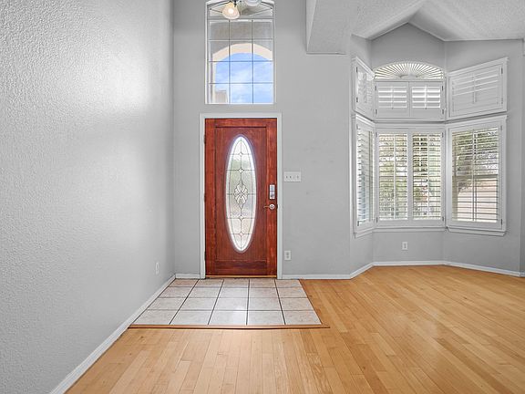 Entryway and bay window with custom shutters