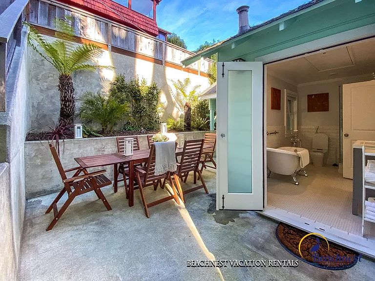 French doors open to lovely landscaped patio.