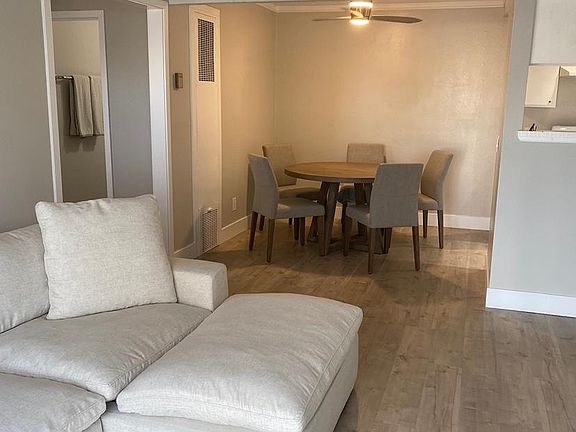 Living room and dinning room. 5 seater dinning table.