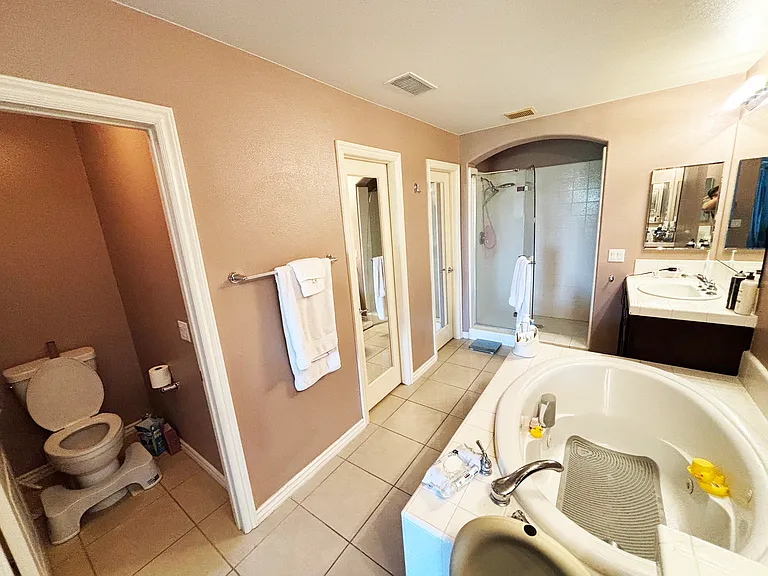 Primary Bathroom with Walk-In Closet