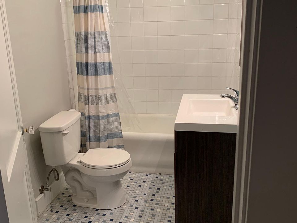 Newly renovated bathroom, new vanity and new tile in the shower.