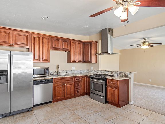 Open Kitchen with Living Room off to Right