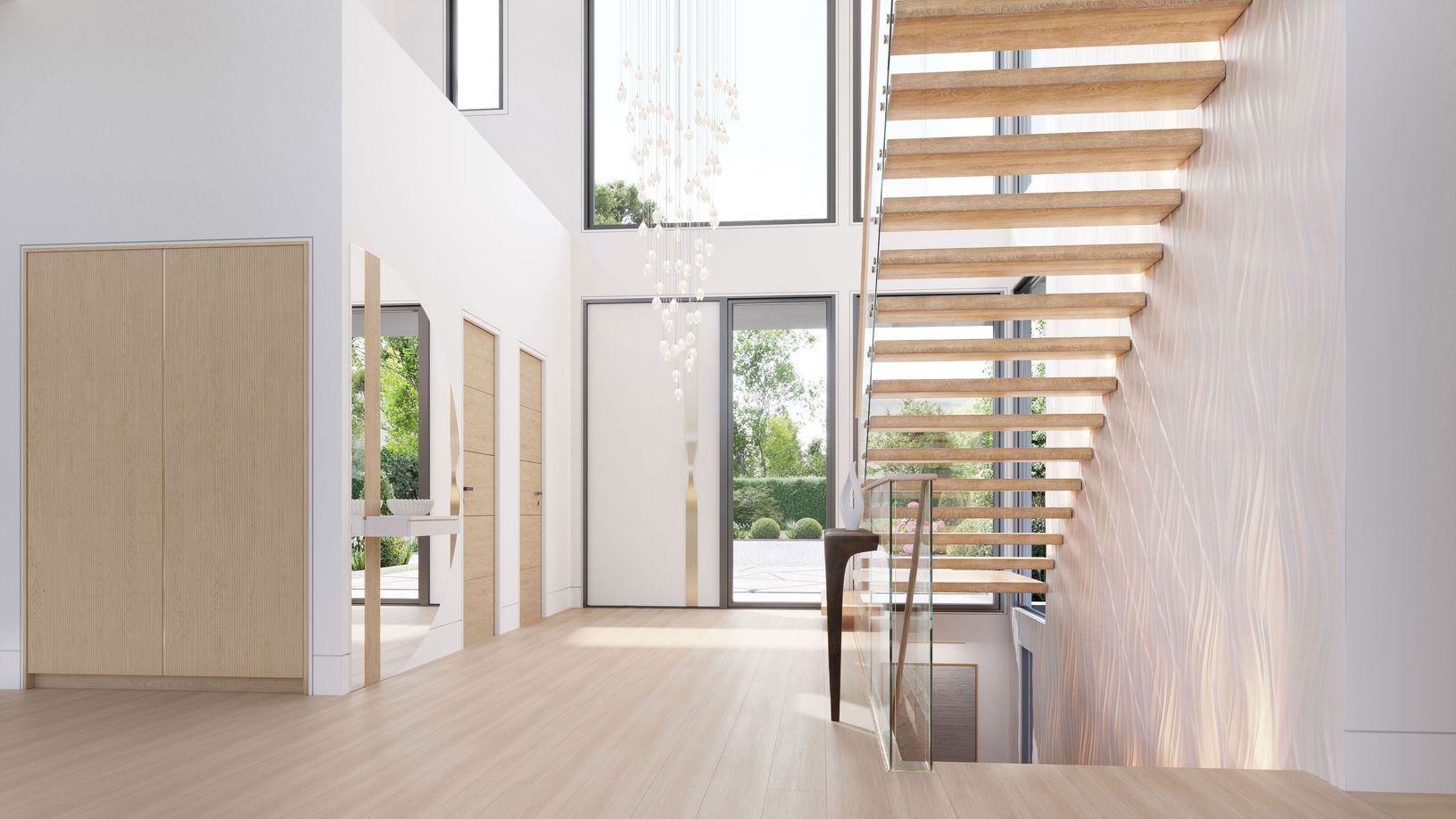  A striking custom pivot door opens to a light-filled foyer.