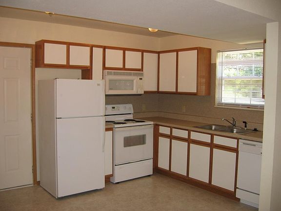 New Tile in Kitchen with Dishwasher, Stove, Fridge and Micor