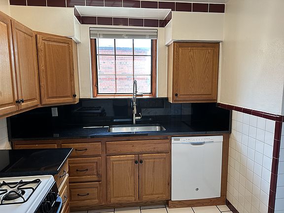 Kitchen - stove, microwave, dishwasher, refrigerator, lots of cabinets.