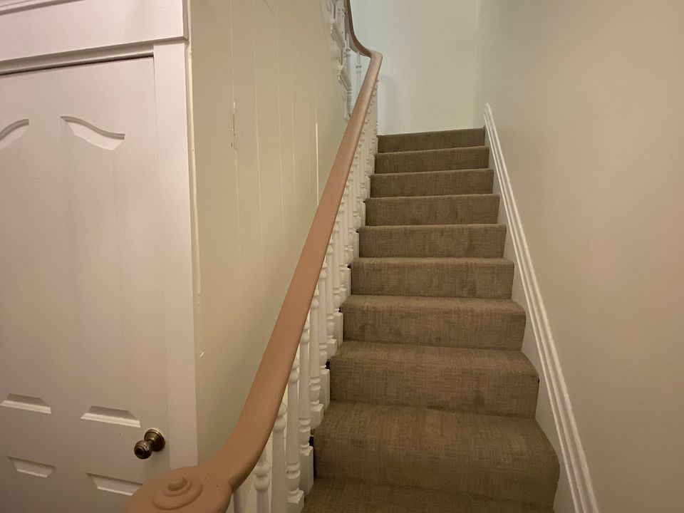 Coat closet on the 1st floor in the entryway. NEW carpet on the stairs.