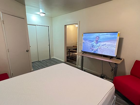 Bedroom, furnished view. The unit furnished as opposed to not being furnished totals: Unfurnished: $350 week/ $1400 month. Furnished: $475 week/ $1900 month. Deposit required.