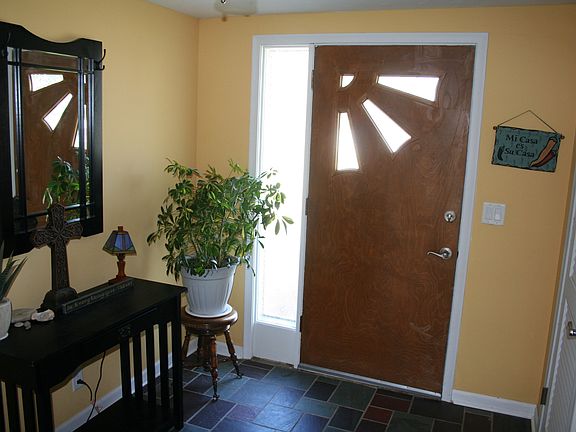 Bright entrance with a real slate floor!