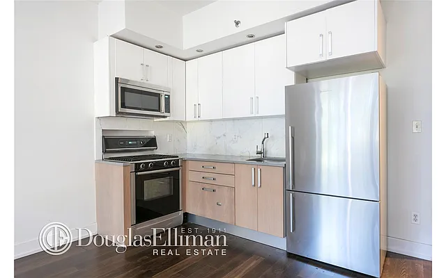 Sold by Douglas Elliman | media 17